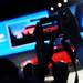 A member of the audience photographs the Chevrolet Code 130R during a press preview at the North American International Auto Show in Detroit at Cobo Hall on Monday morning.  Melanie Maxwell I AnnArbor.com